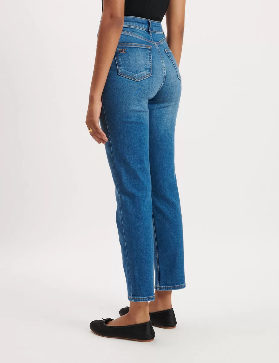 Mid Wash High Rise Slim Leg Jeans