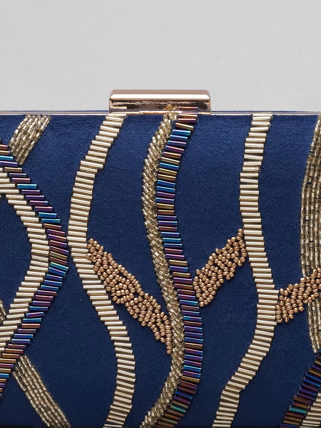 Rubans Blue Colour Box Clutch With Embroided Gold Design.